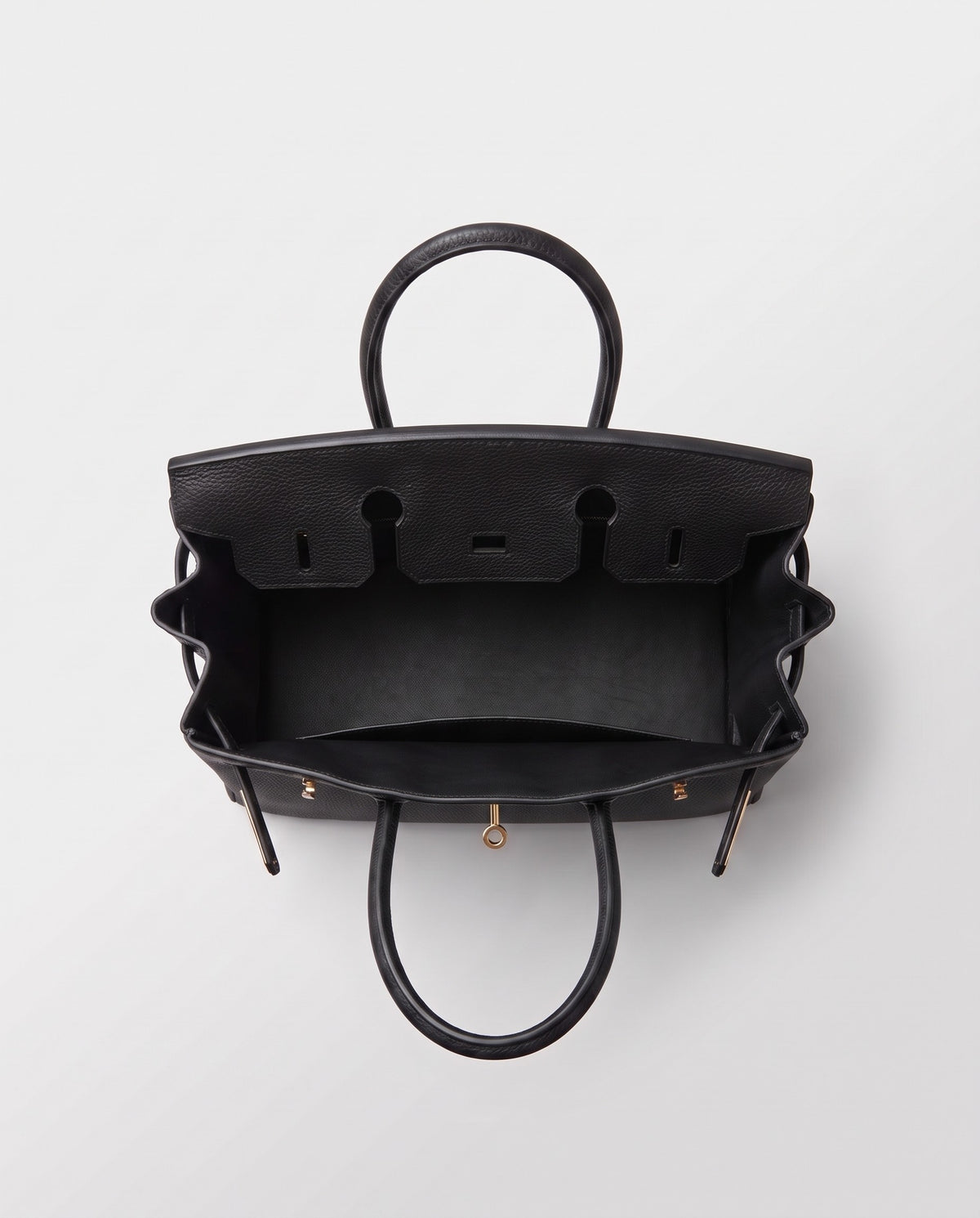 Lock Medium leather top-handle bag in Black – inside view showing the leather lining