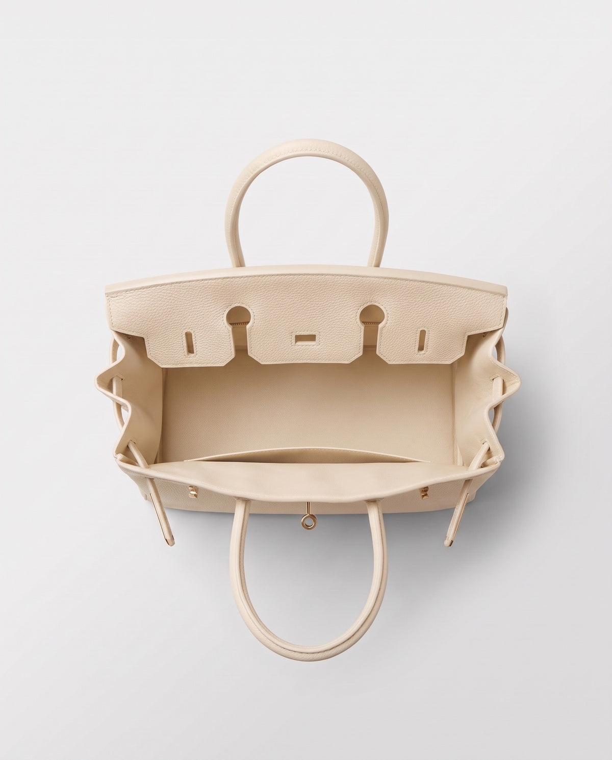 Lock Medium leather top-handle bag in Cream – inside view showing the leather lining