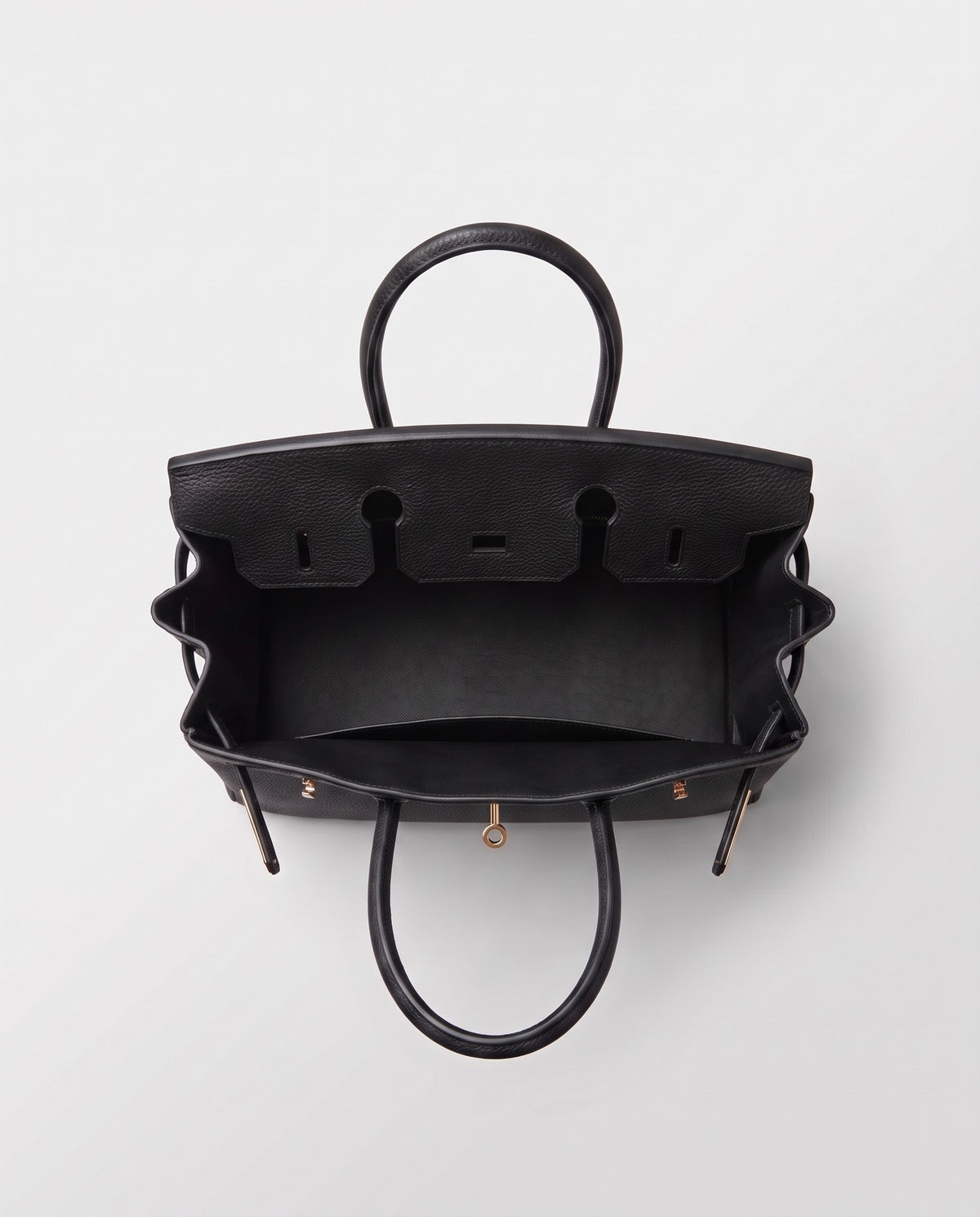 Lock Small leather top-handle bag in Black – inside view showing the leather lining