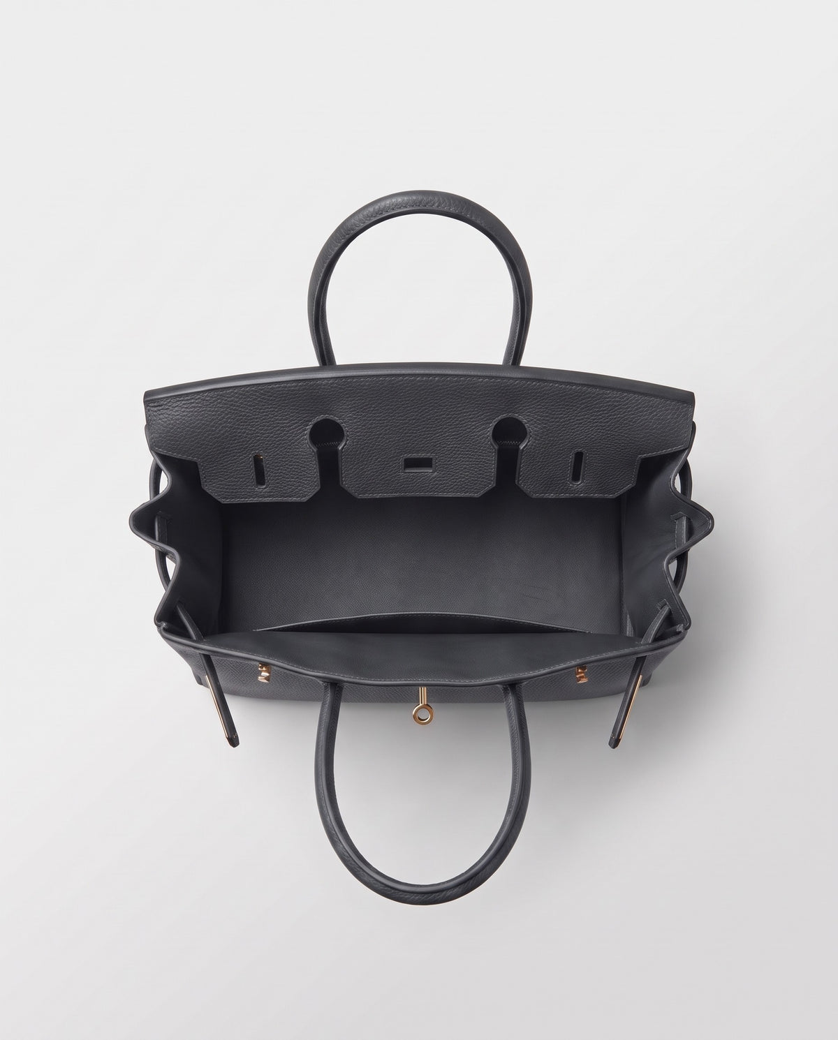 Lock Small leather top-handle bag in Charcoal – inside view showing the leather lining