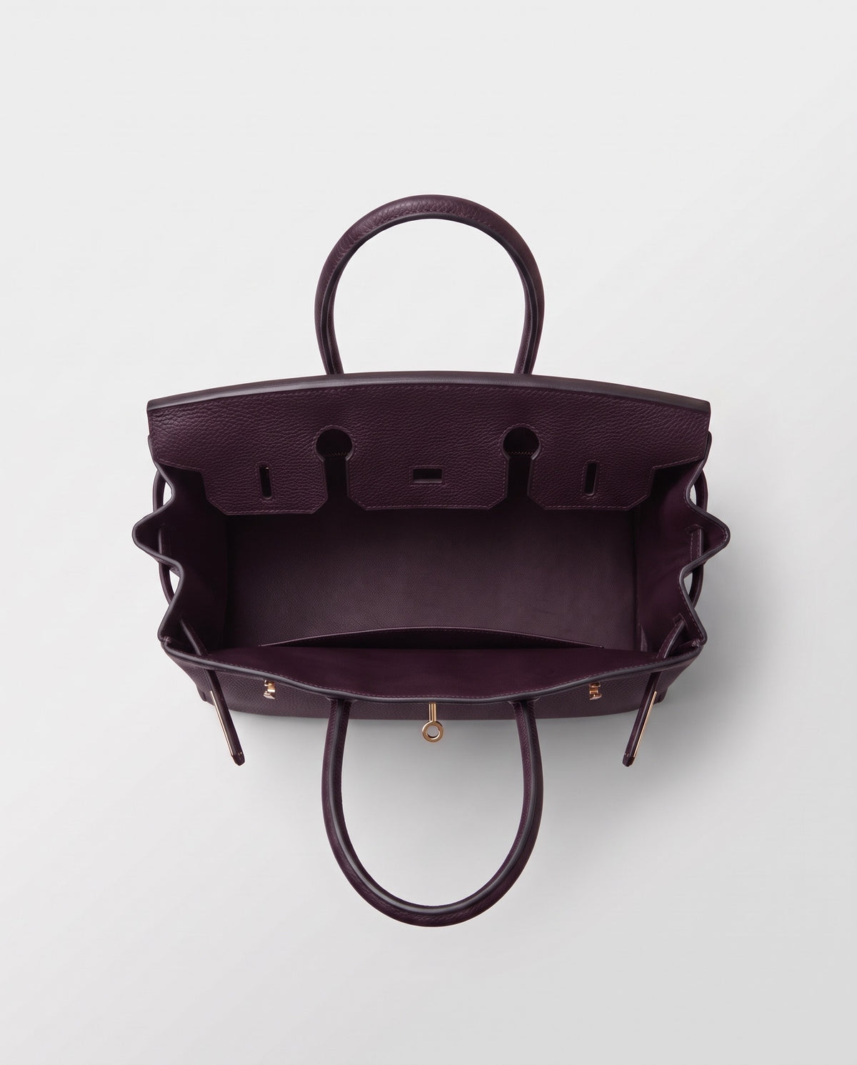 Lock Small leather top-handle bag in Purple – inside view showing the leather lining