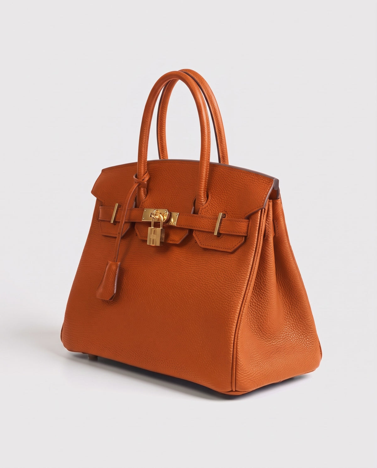 Lock Small leather top-handle bag in Terracotta – three-quarter view