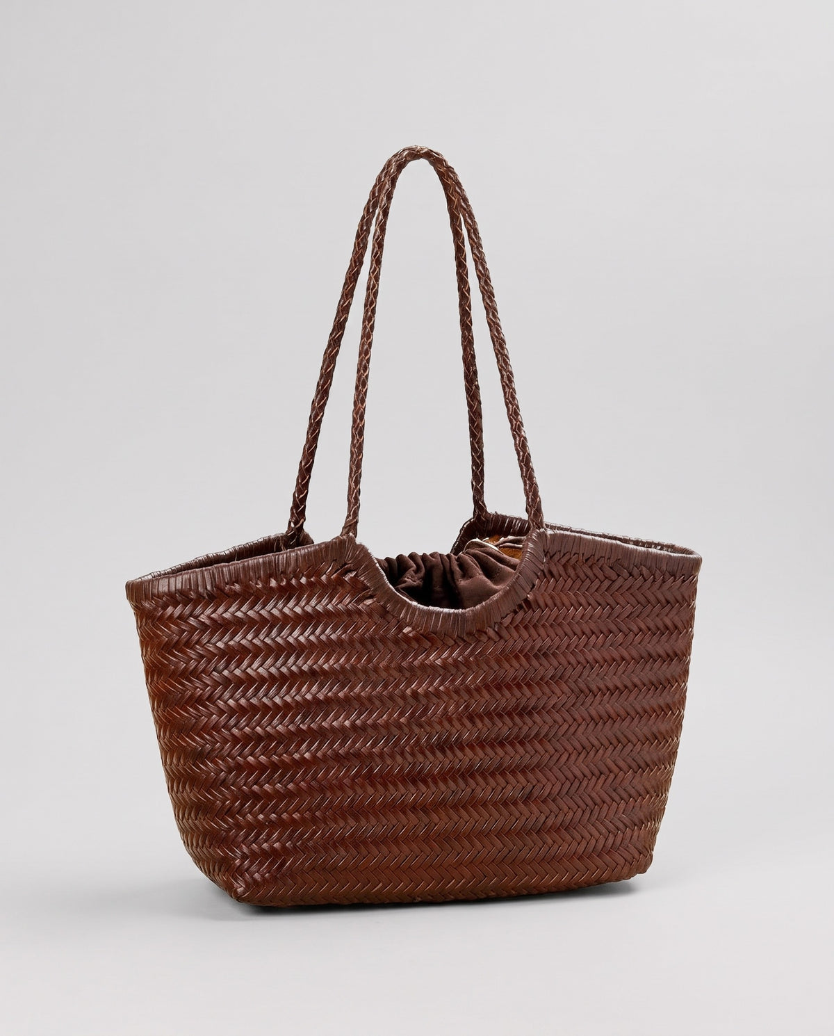 Hardware and handle detail on the Valentina Matera Large bag in Chocolate