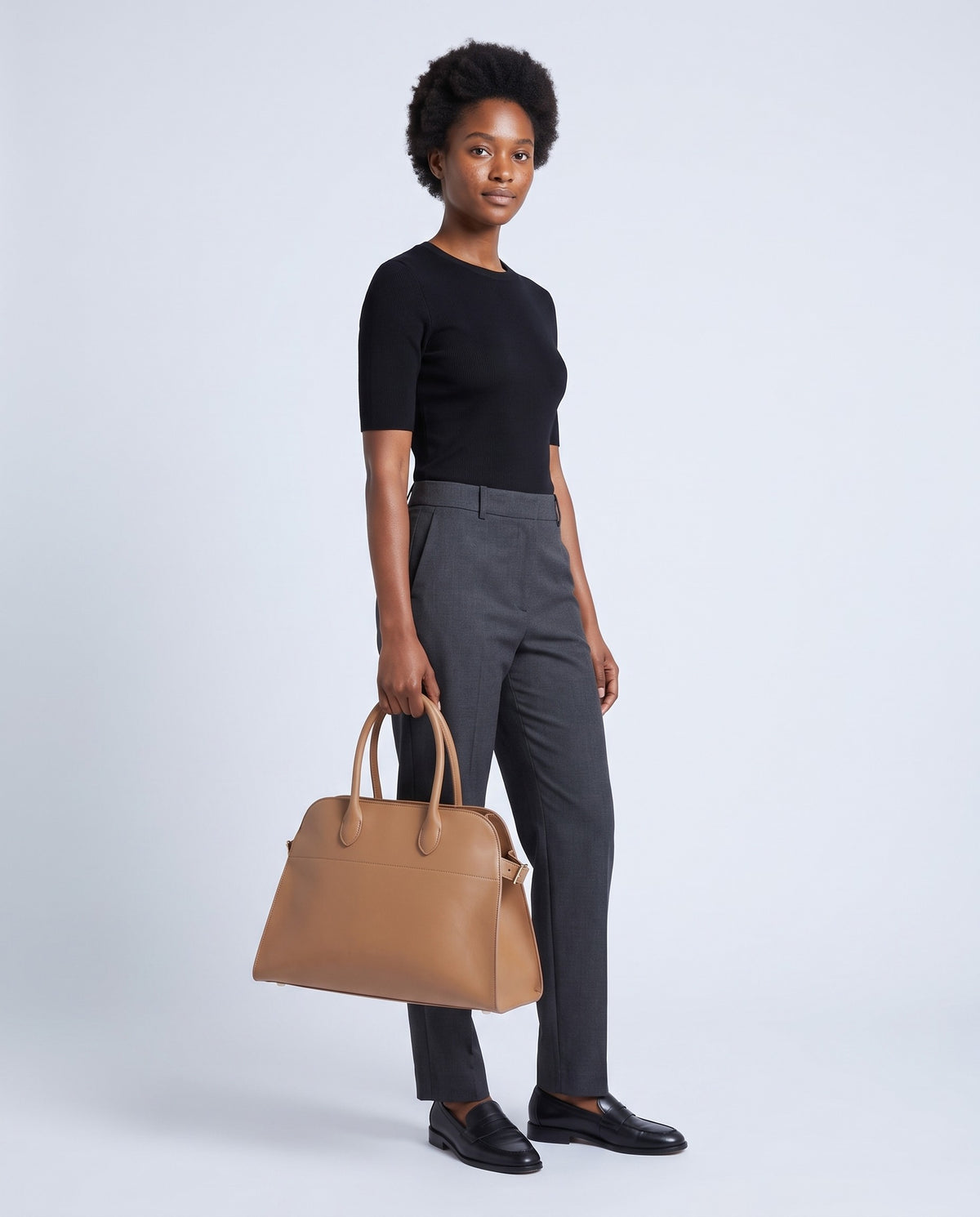 Model carrying the Milano Large bag in Camel leather – full length