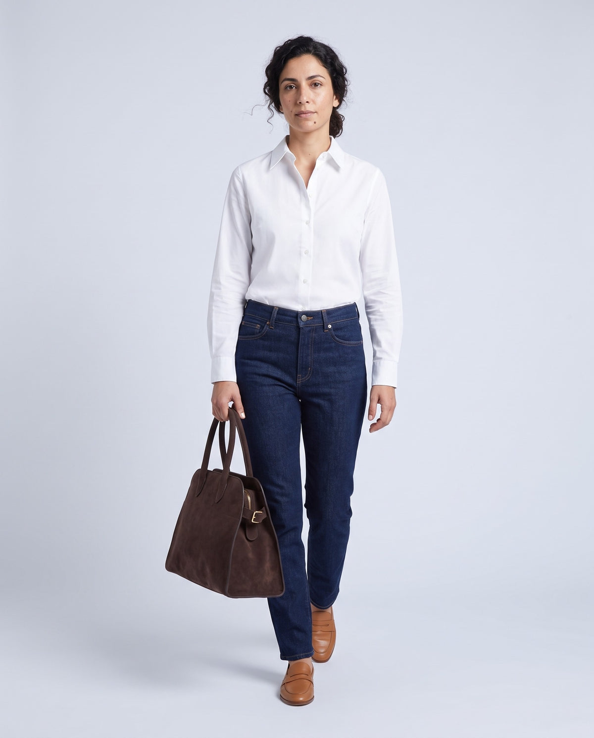 Model carrying the Milano Large bag in Espresso brown suede – full length