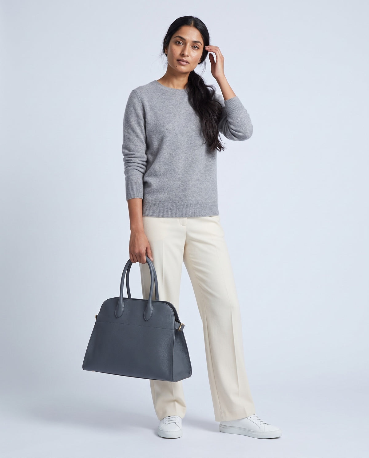 Model carrying the Milano Large bag in Slate grey leather – full length
