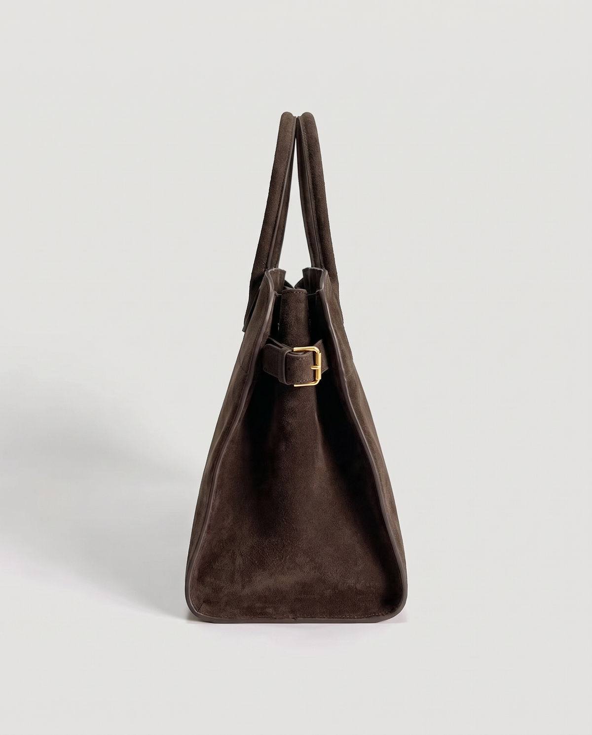 Milano Small top-handle bag in Chocolate suede – side view showing the buckled side strap