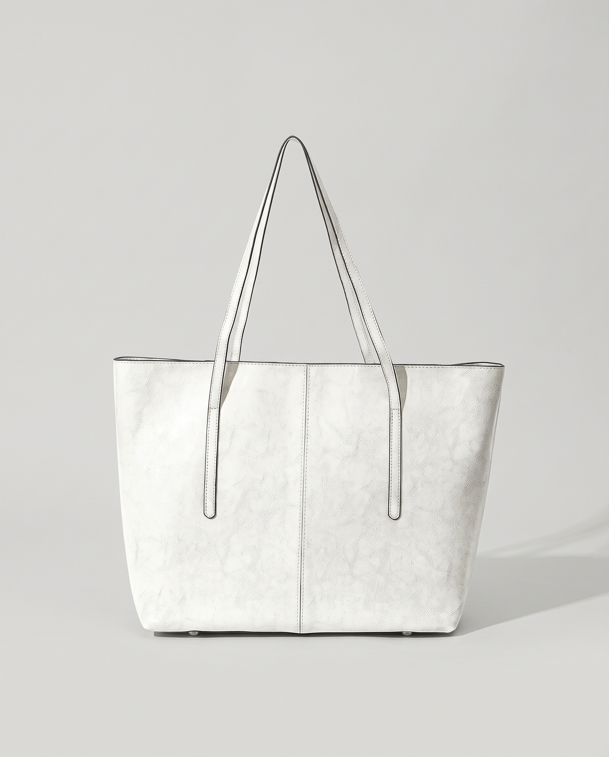 Molo oil-waxed leather tote in white, front view