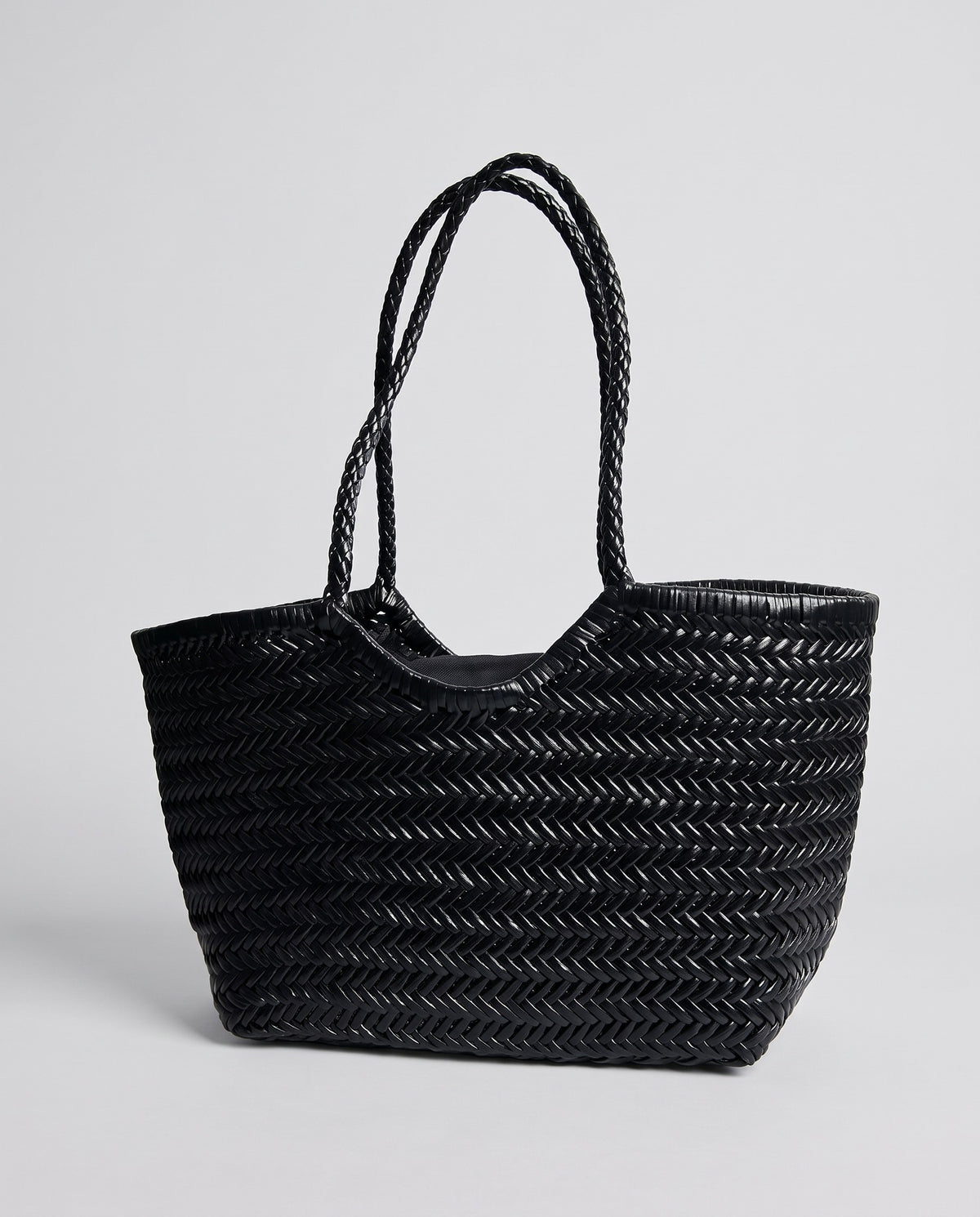 Hardware and handle detail on the Valentina Noto Small bag in Black