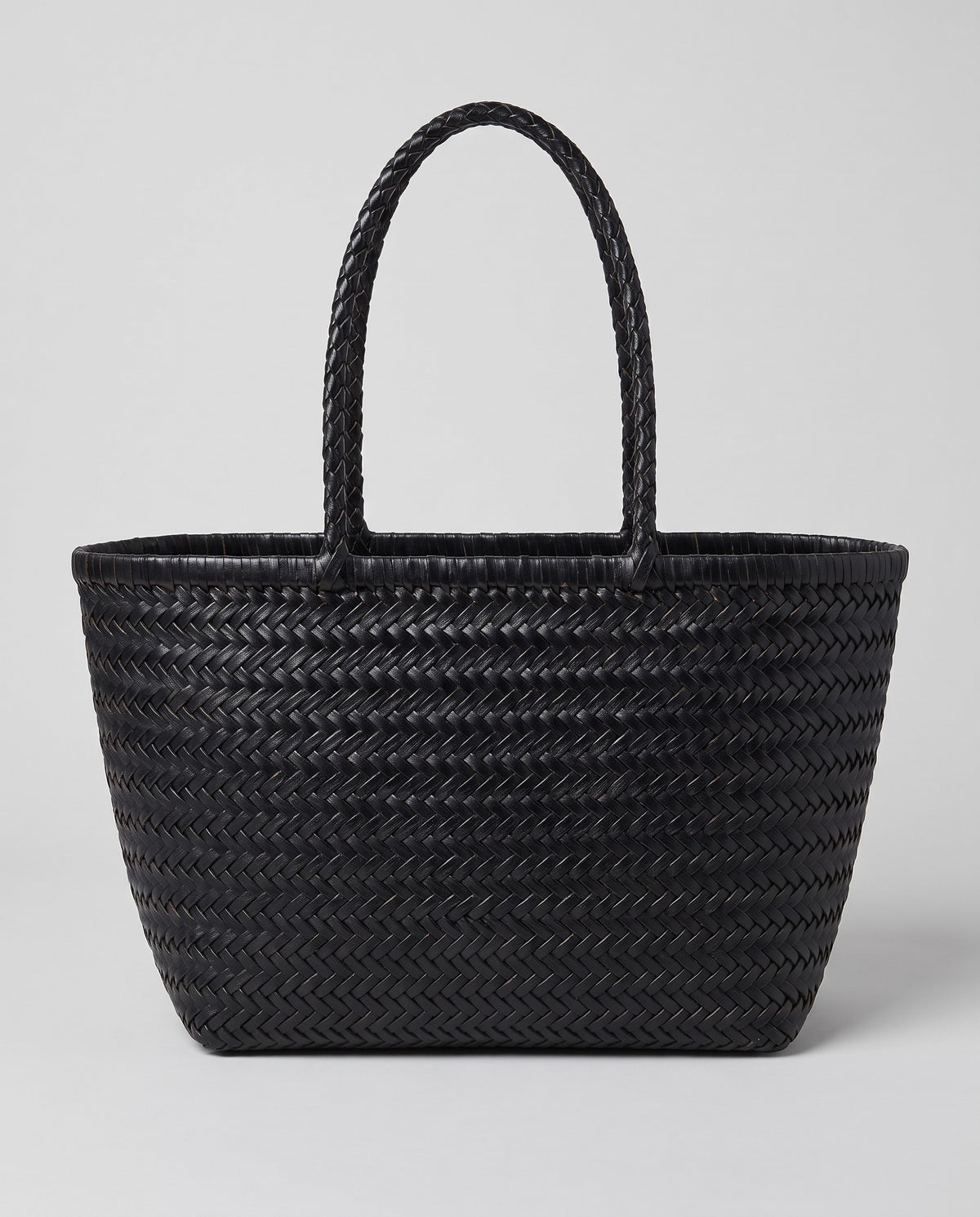 Hardware and handle detail on the Valentina Noto Small bag in Onyx