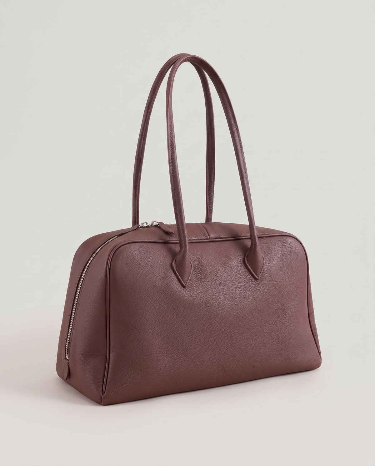 Ora Small leather shoulder bag in Chocolate – three-quarter view