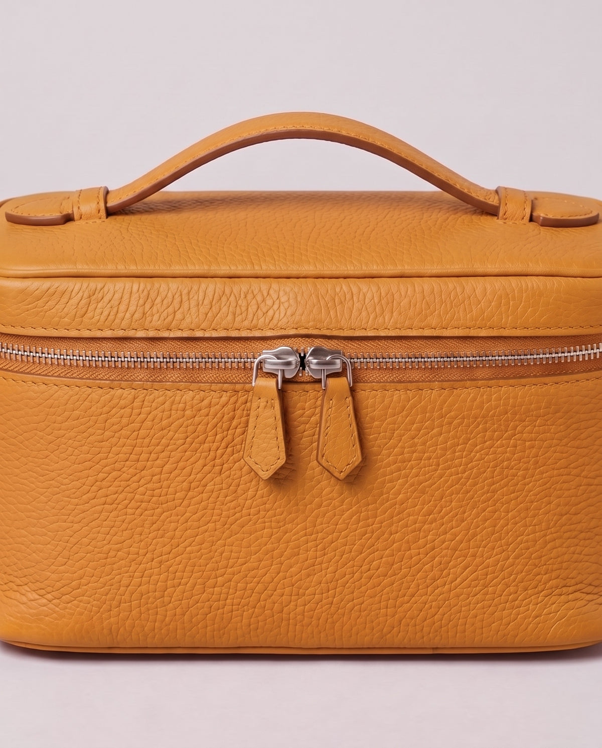 Silver zip and handle detail on the Valentina Orvieto Small bag in Camel leather