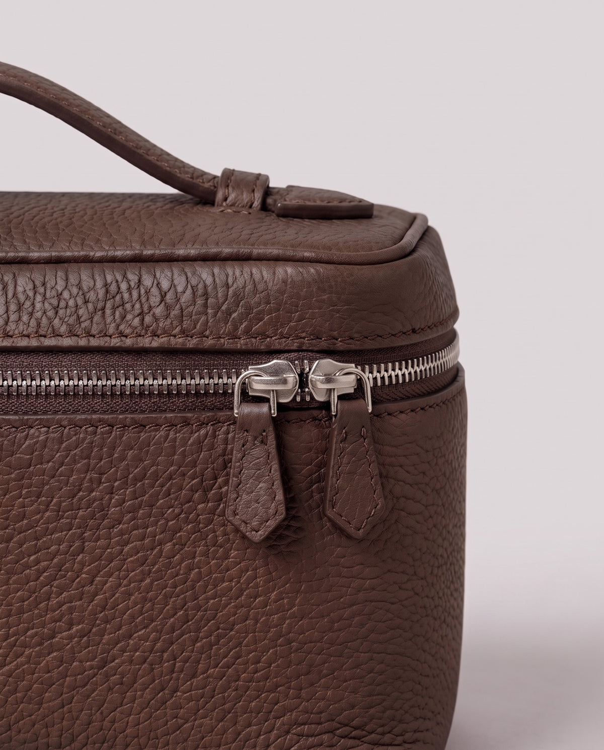 Pebbled leather close-up of the Valentina Orvieto Small bag in Chocolate