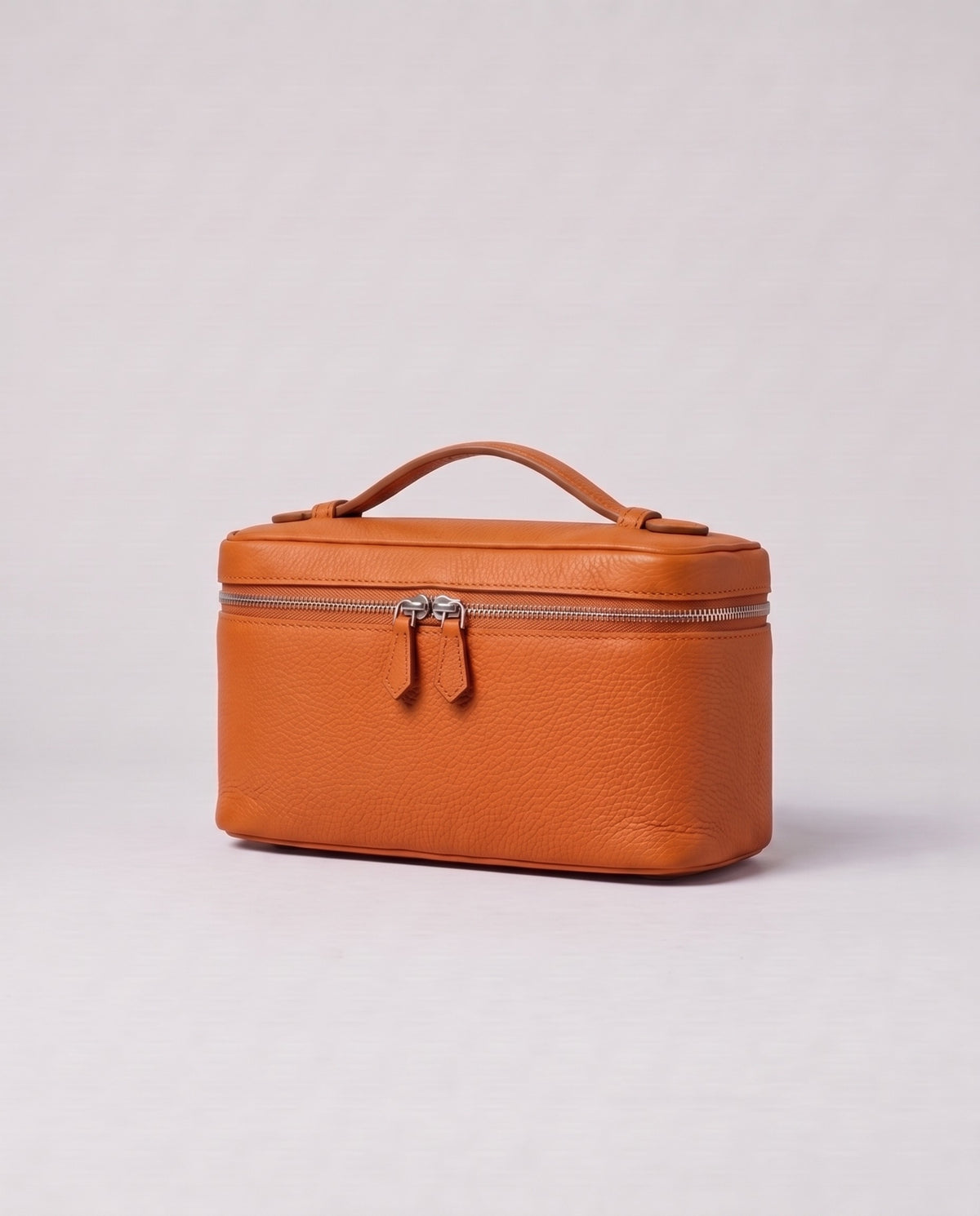 Valentina Orvieto Small top-handle bag in Cognac leather, three-quarter view