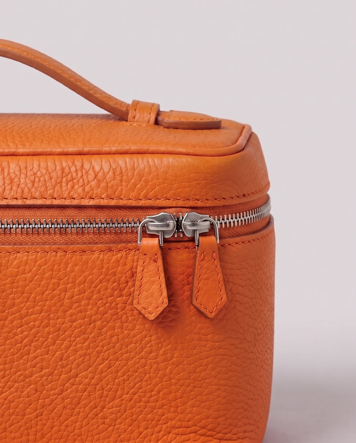 Pebbled leather close-up of the Valentina Orvieto Small bag in Cognac