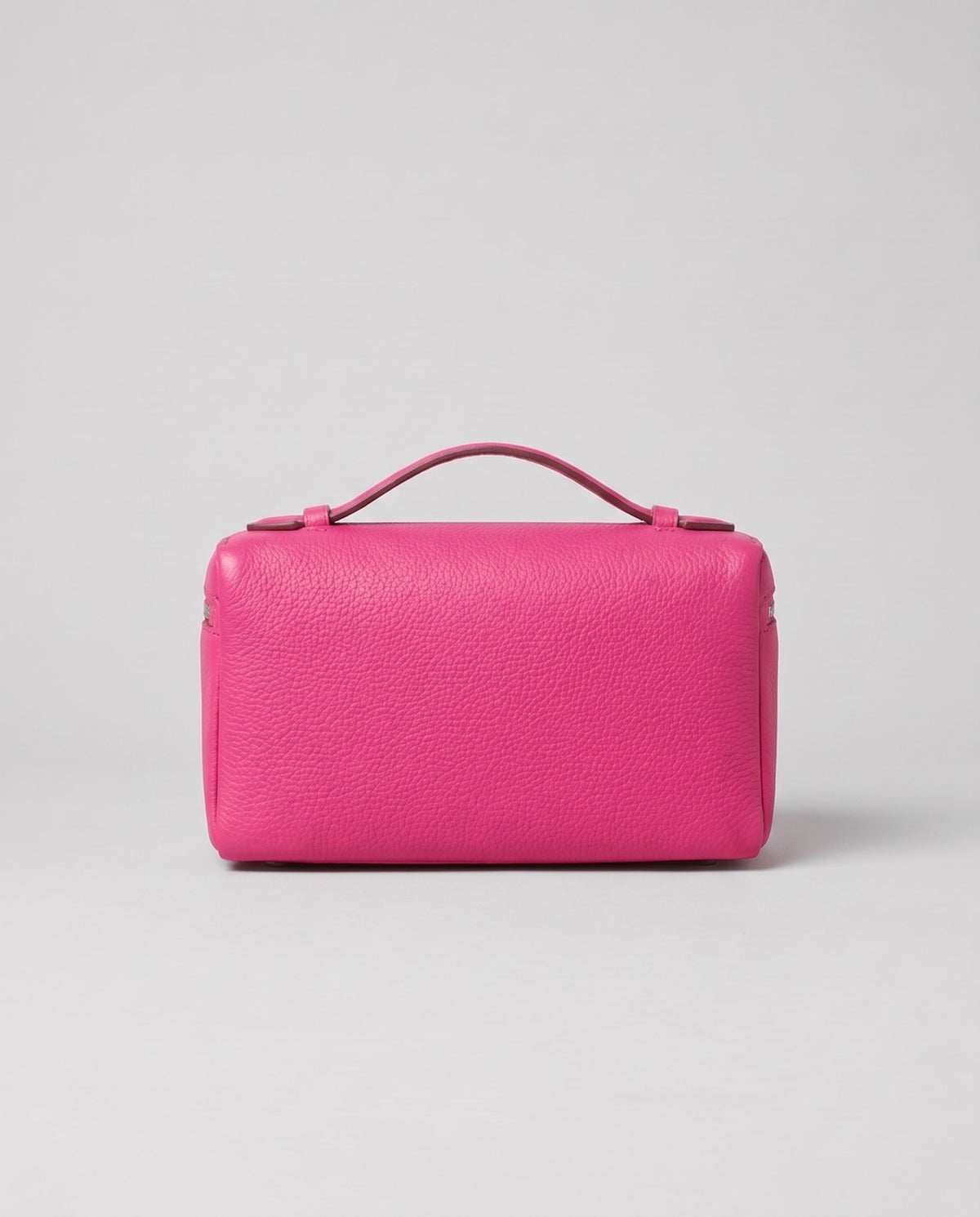 Orvieto pebbled leather vanity case in Fuchsia – back view