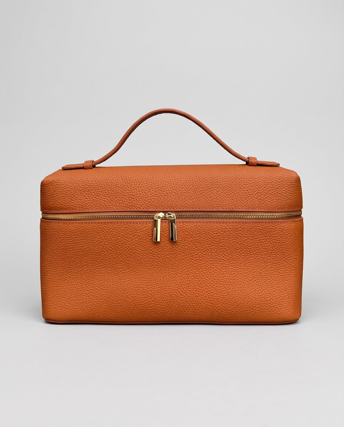 Orvieto pebbled leather vanity case in Cognac – front view