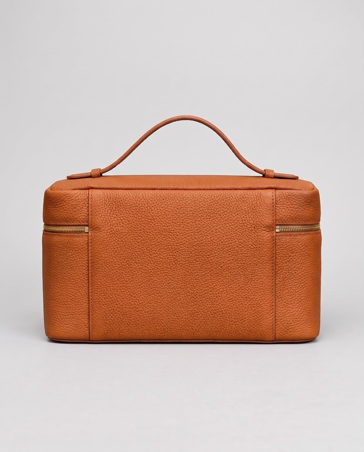 Orvieto pebbled leather vanity case in Cognac – back view