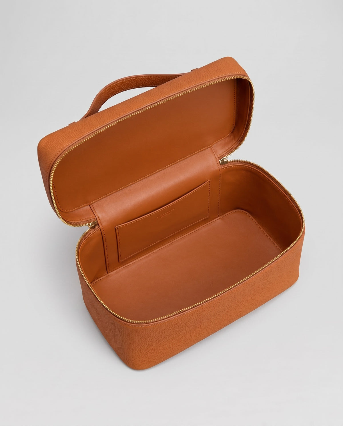 Inside view of the Orvieto vanity case in Cognac