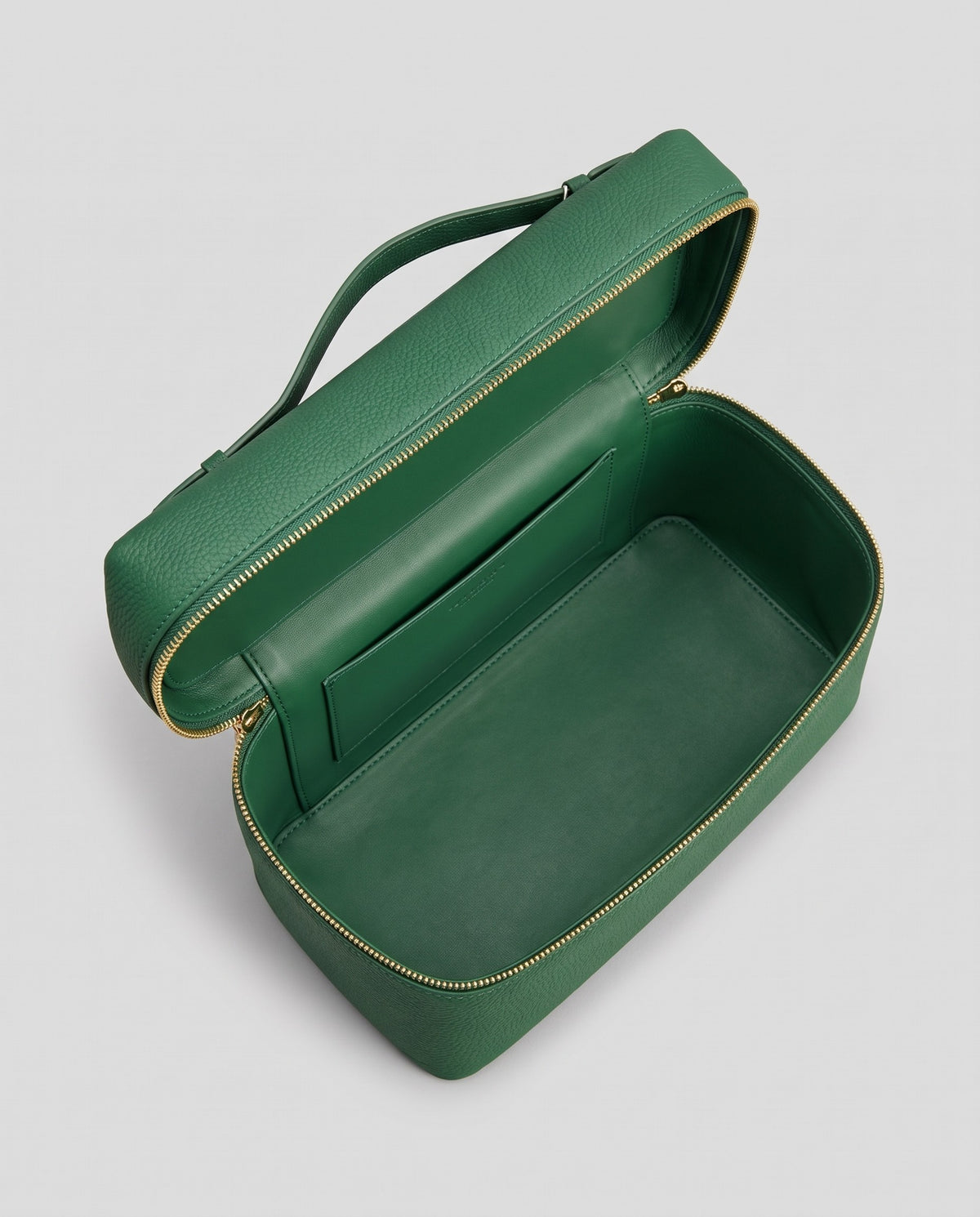 Inside view of the Orvieto vanity case in Green