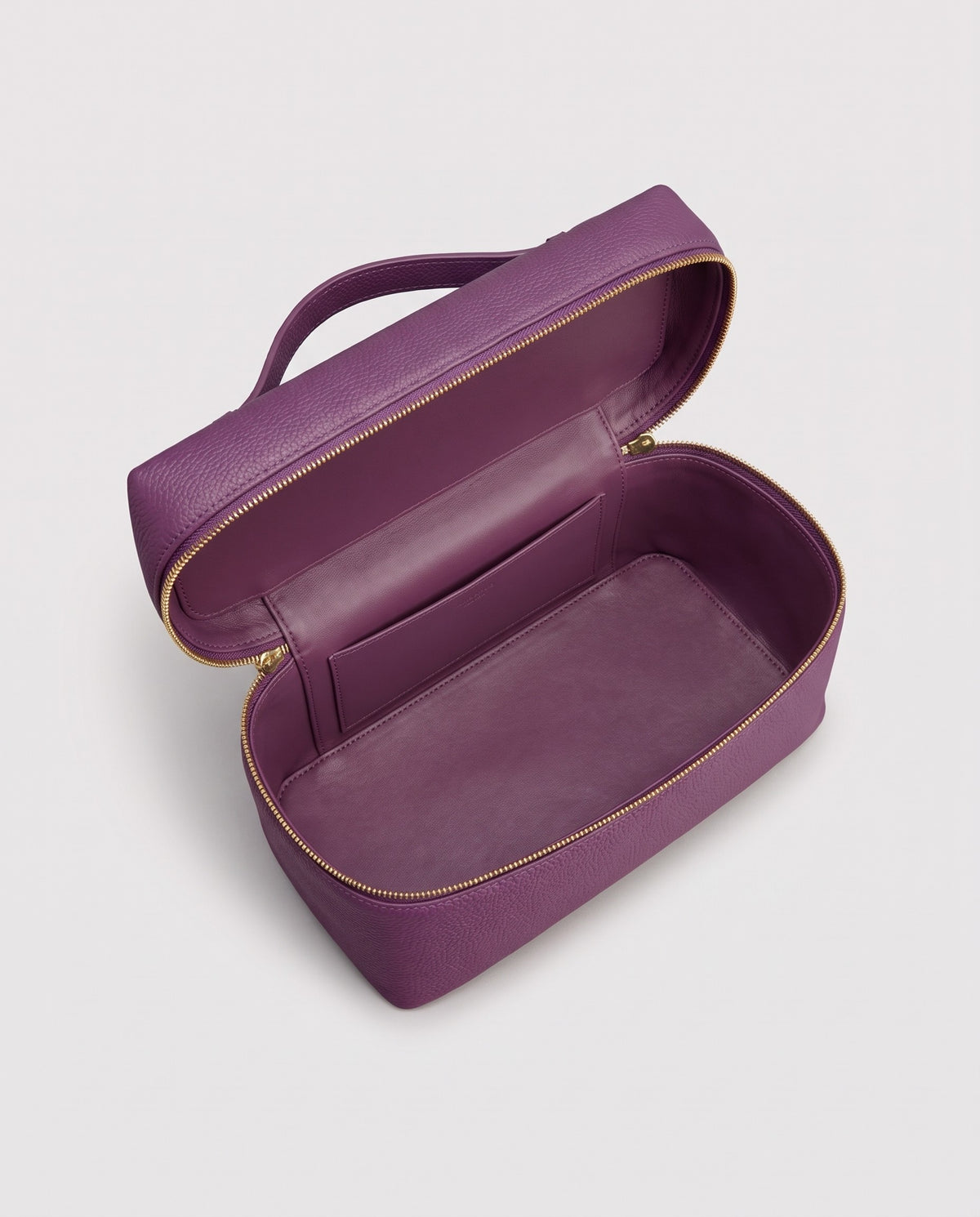 Inside view of the Orvieto vanity case in Purple