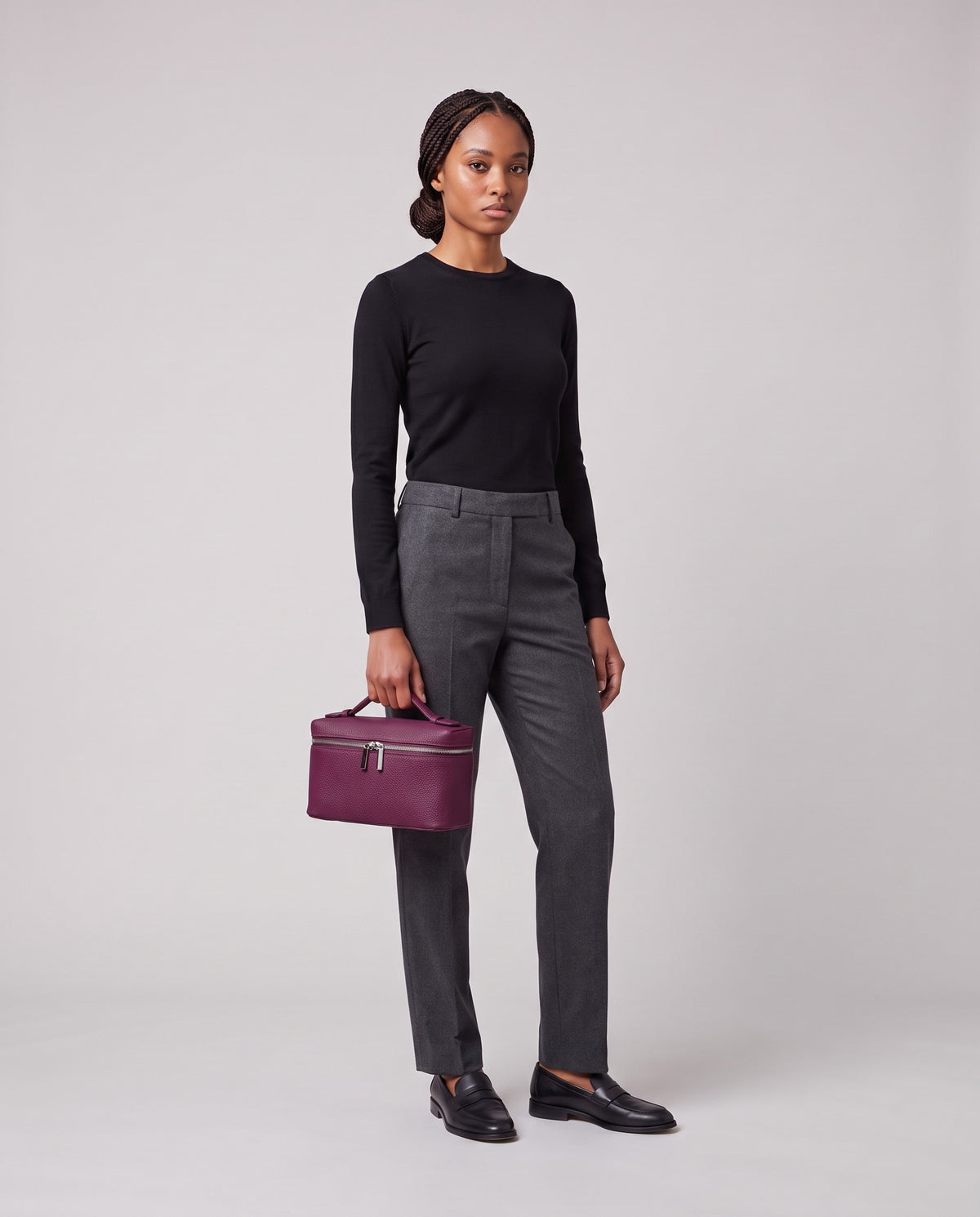Model holding the Valentina Orvieto Small top-handle bag in Purple leather, full length