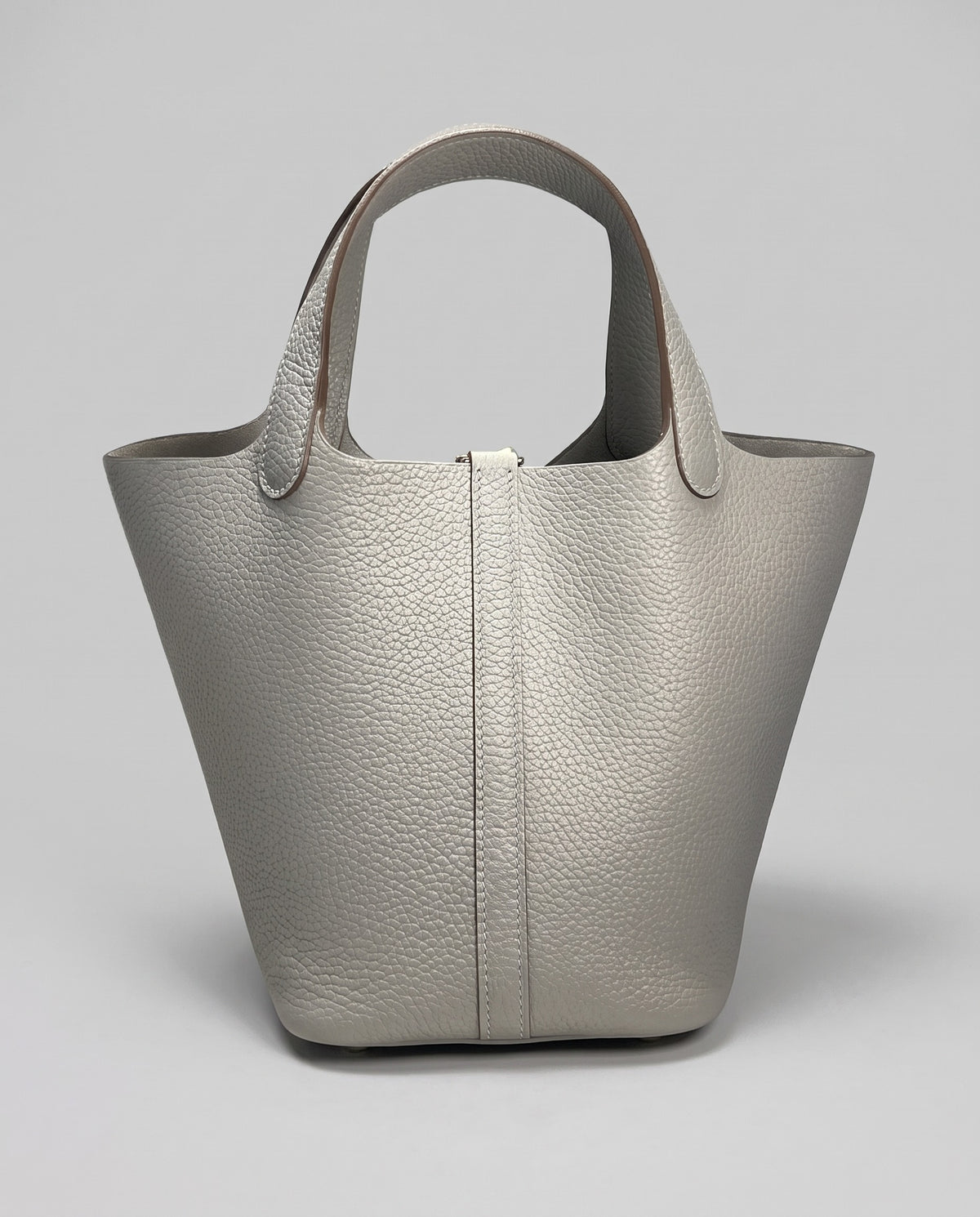 Hardware and handle detail on the Valentina Ostuni Large bag in Ivory