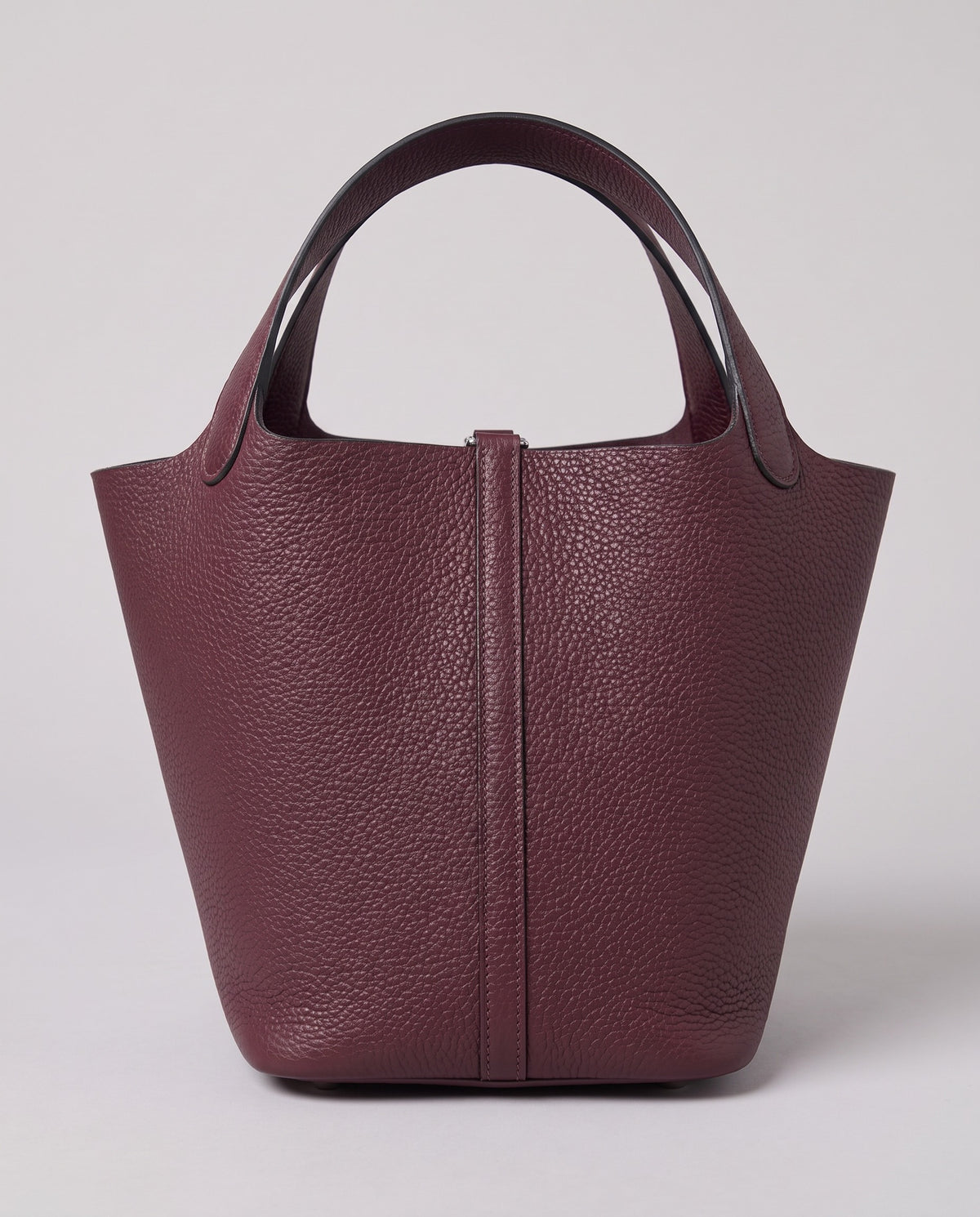 Hardware and handle detail on the Valentina Ostuni Large bag in Plum