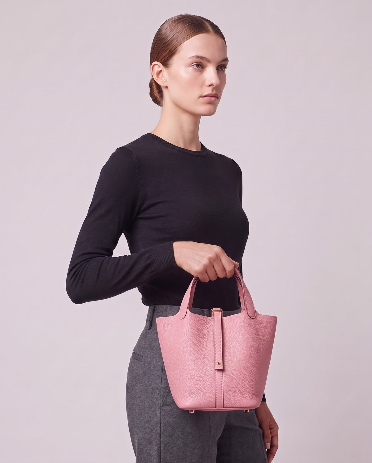 Model carrying the Valentina Ostuni Large bag in Rose