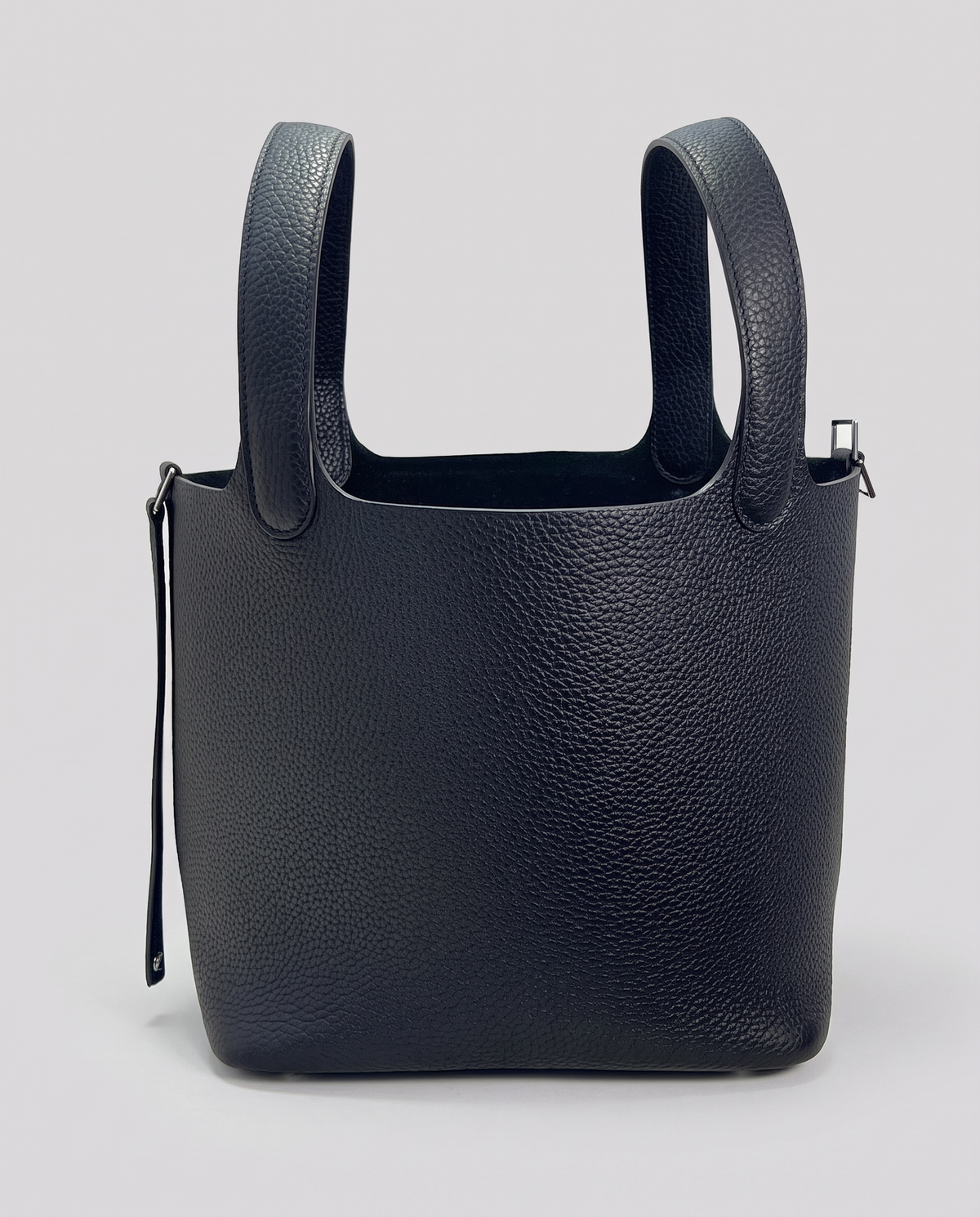 Hardware and handle detail on the Valentina Ostuni Small bag in Black