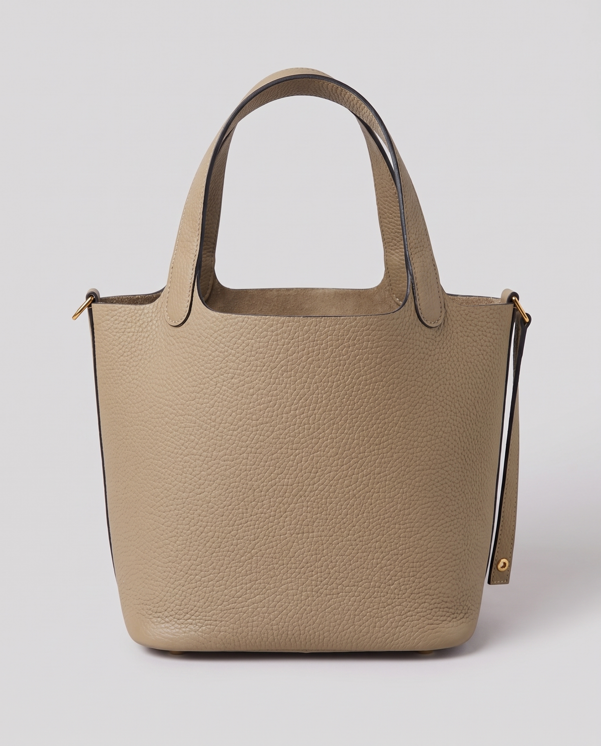 Hardware and handle detail on the Valentina Ostuni Small bag in Denim