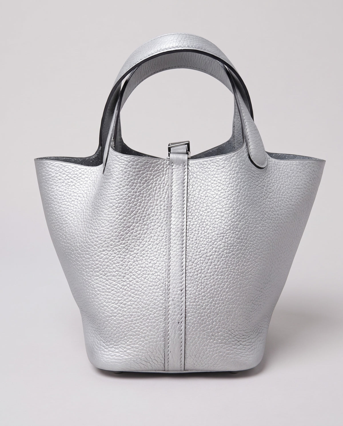 Hardware and handle detail on the Valentina Ostuni Small bag in Silver