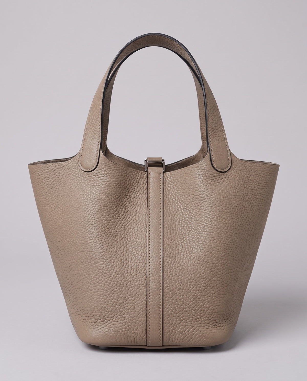 Hardware and handle detail on the Valentina Ostuni Small bag in Stone