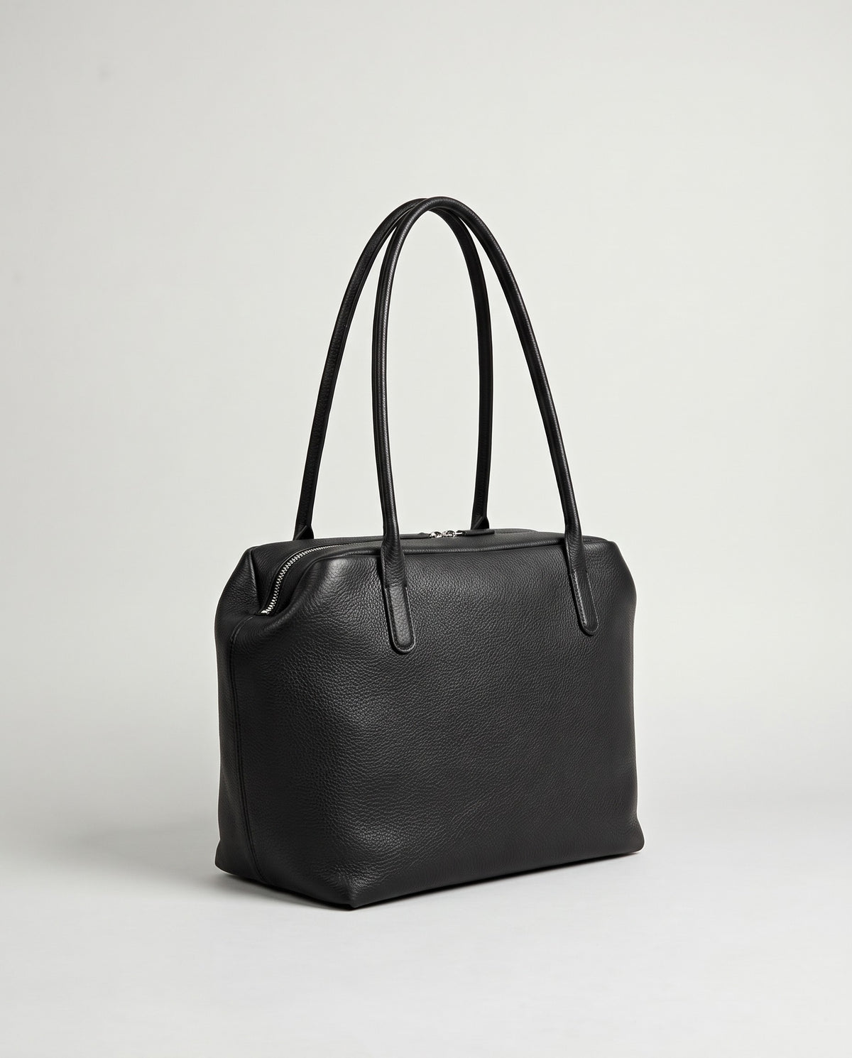 Pavia leather tote in Black – three-quarter view