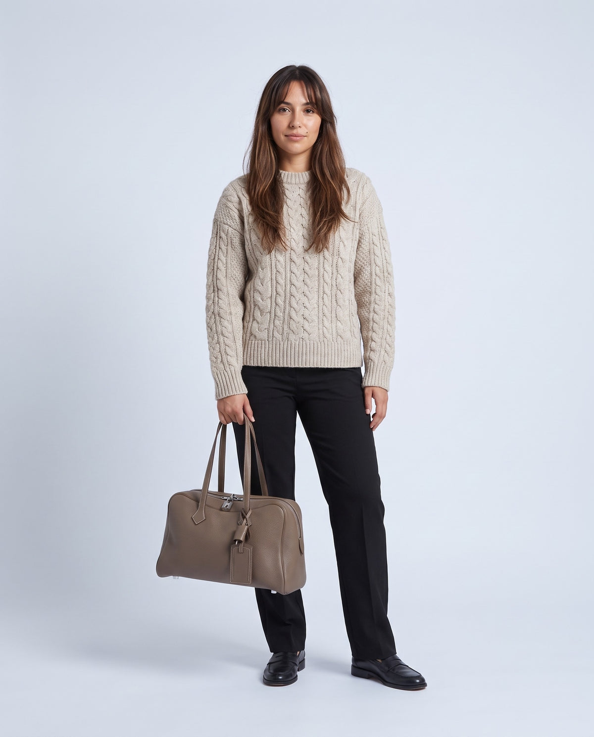 Model wearing the Portofino bowling bag in Taupe – full-length view