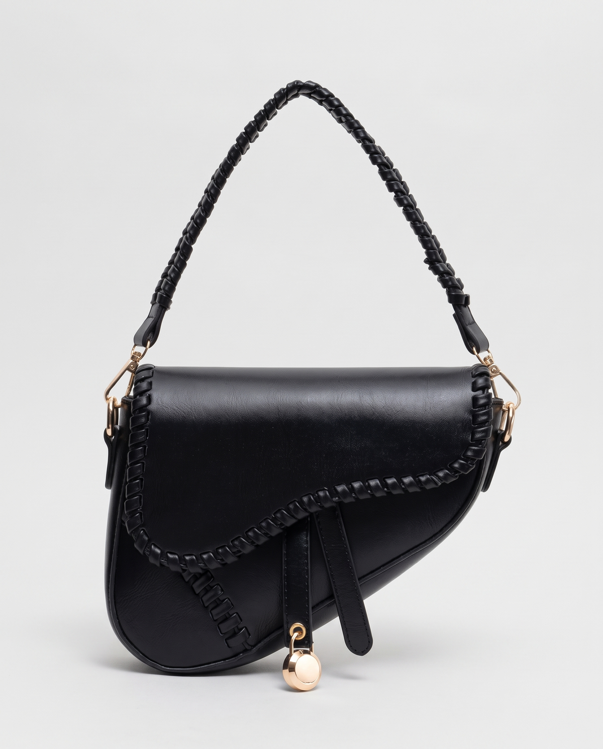Saddle vegan leather shoulder bag in Black – front view