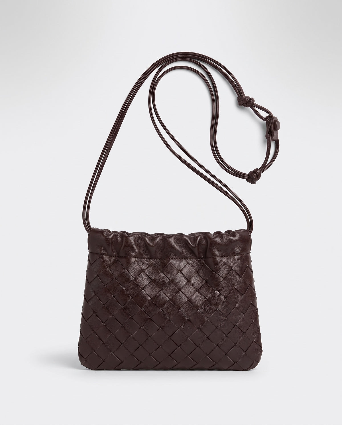 Serata woven leather clutch in Espresso – front view