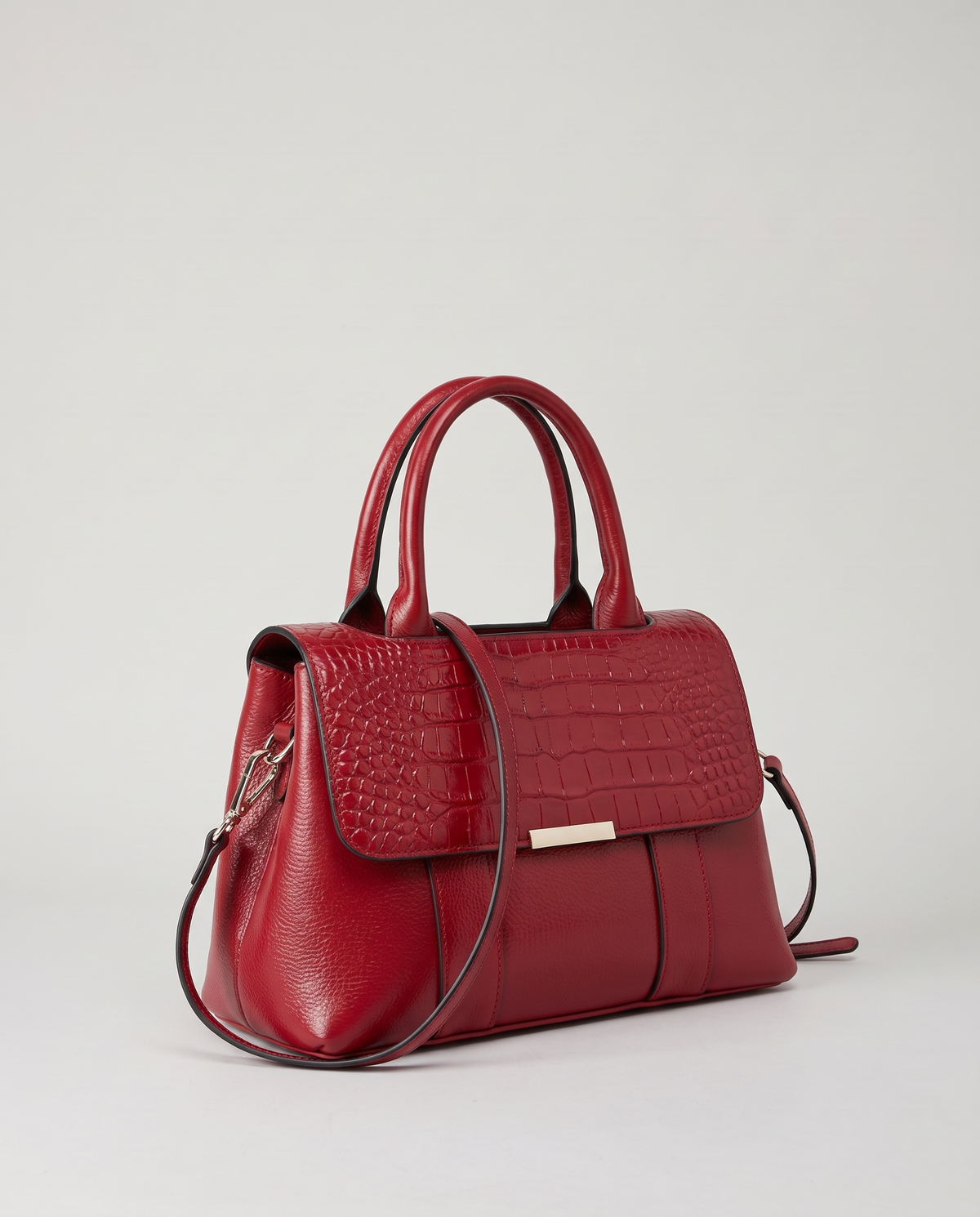 Sloane croc-embossed leather handbag in Red – three-quarter view