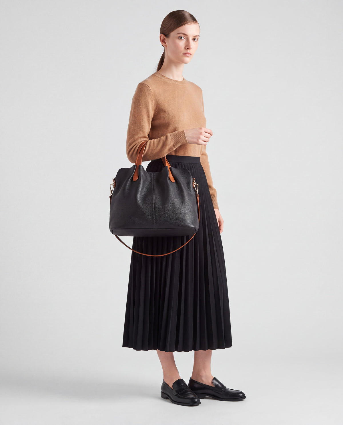 Soft Leather Tote Bag bag in Black – worn by model, close-up