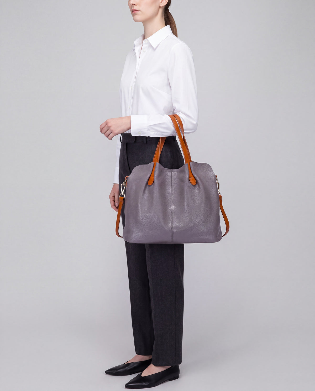 Soft Leather Tote Bag bag in Grey – worn by model, close-up