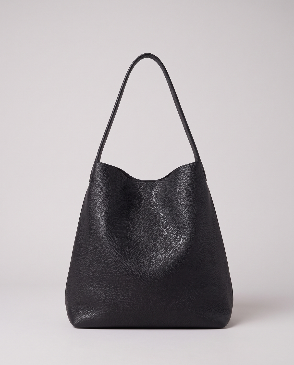 Hardware and handle detail on the Valentina Tela Large bag in Black