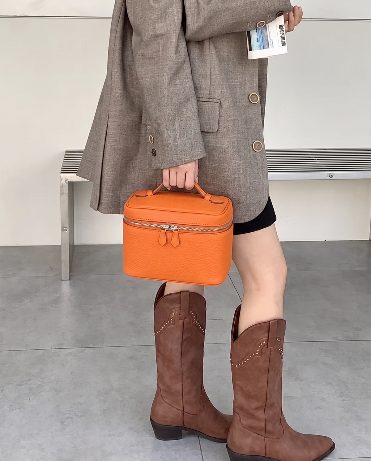 Leather close-up of the Valentina Tela Large bag in Rust