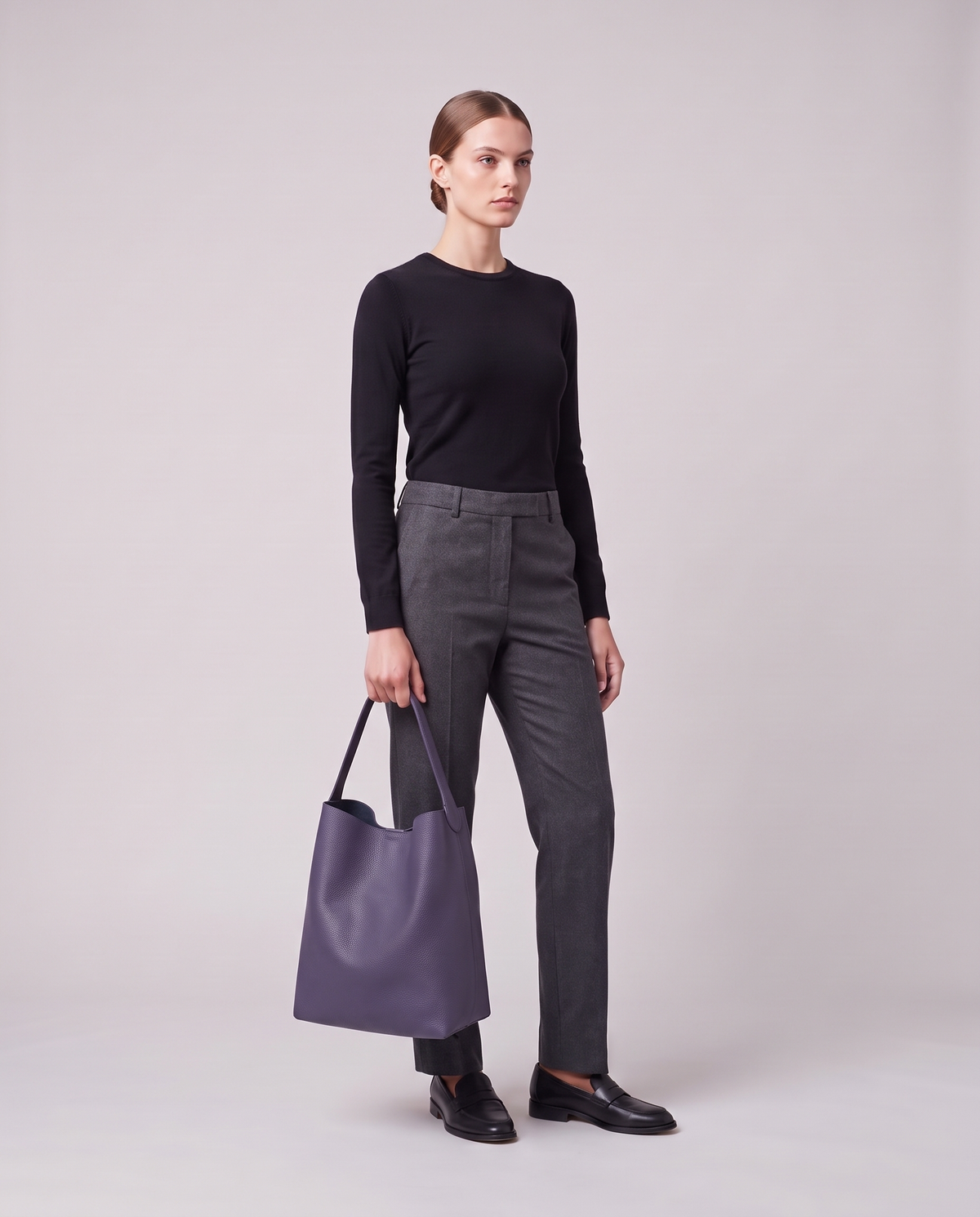 Model holding the Valentina Tela Small bag in Purple, full length