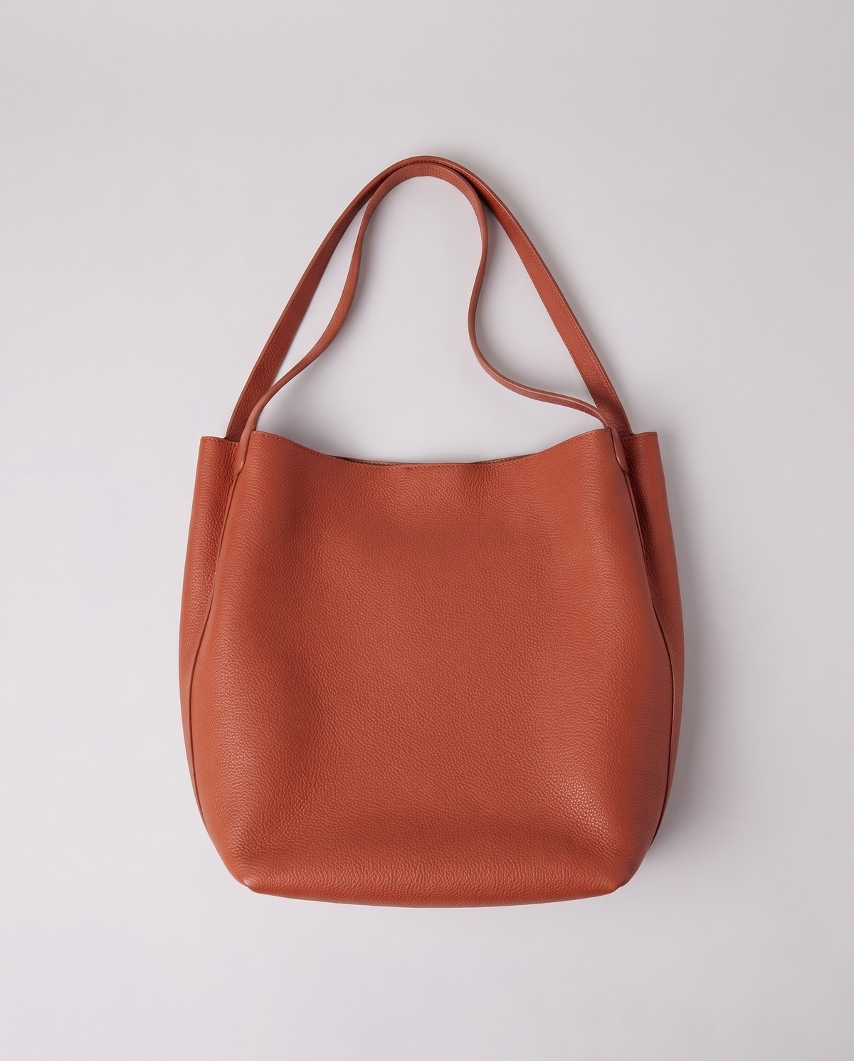 Inside the Valentina Tela Small bag in Rust