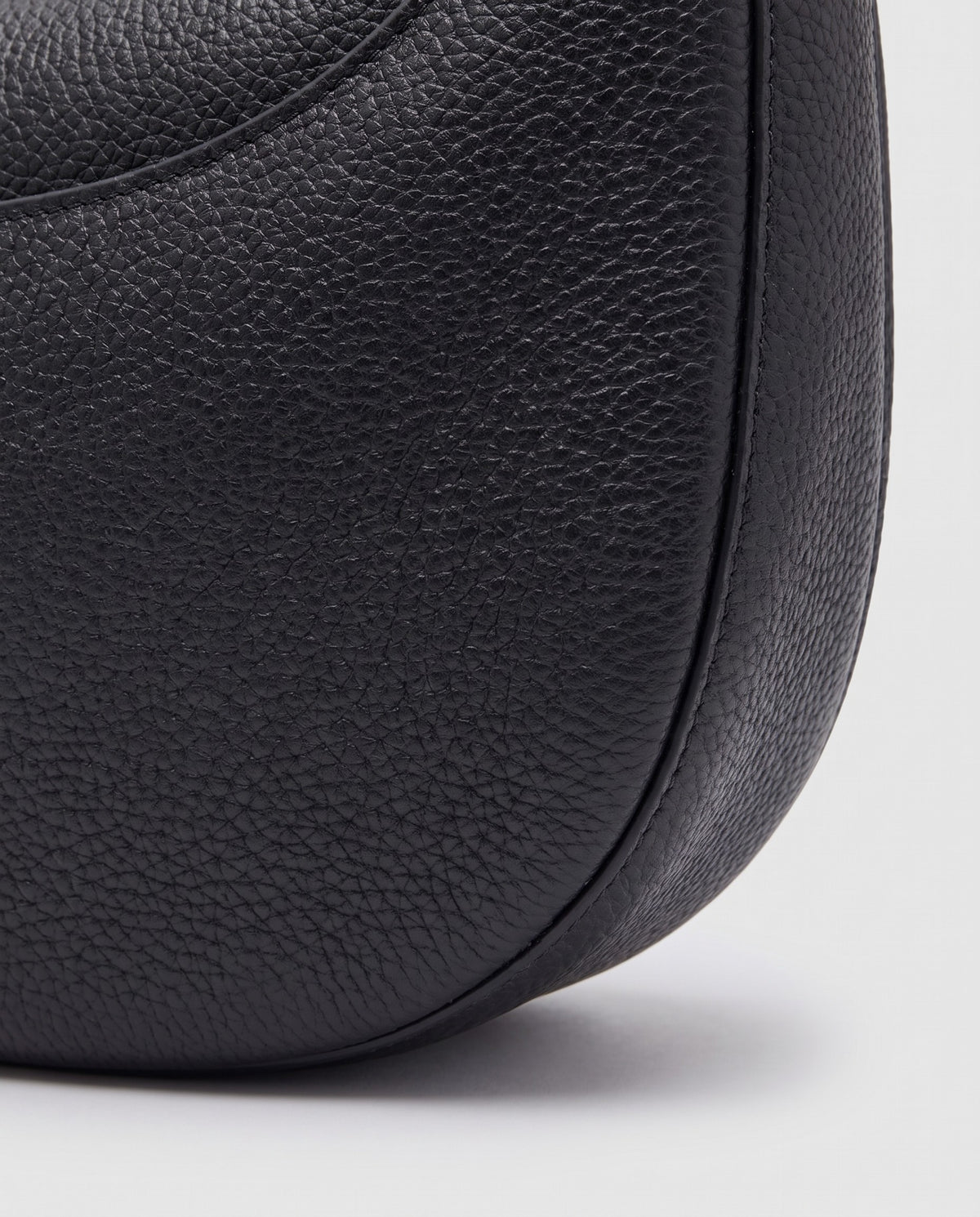 Close-up of the pebbled cowhide leather on the Todi bag in Black