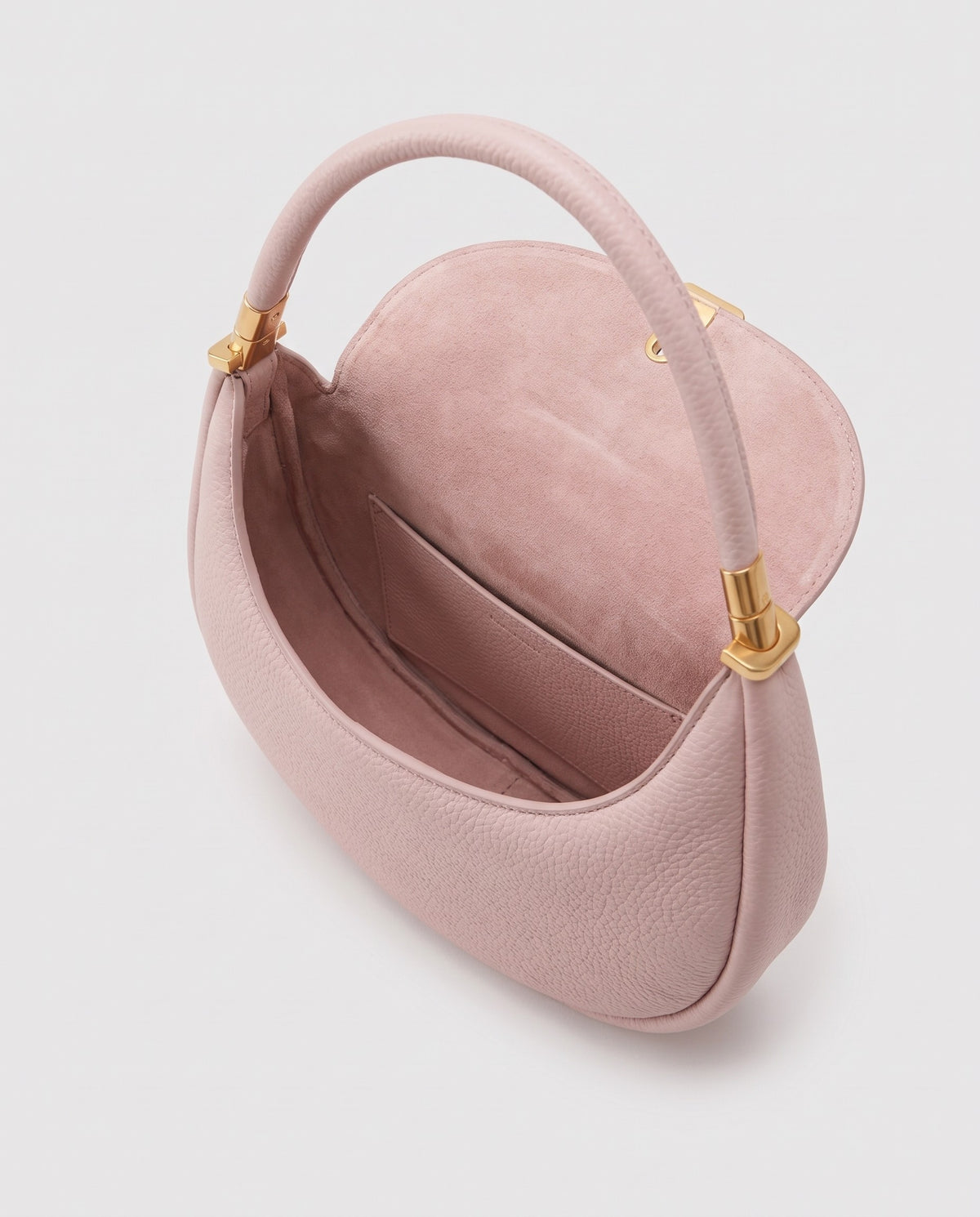 Inside view of the Todi crescent bag in Blush