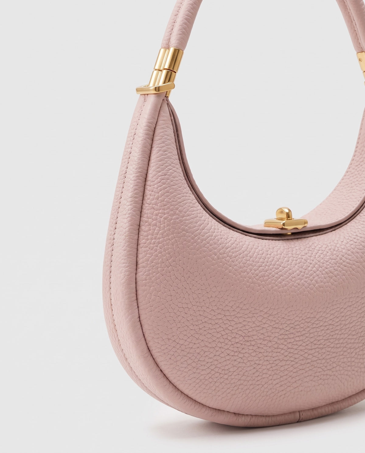 Close-up of the pebbled cowhide leather on the Todi bag in Blush