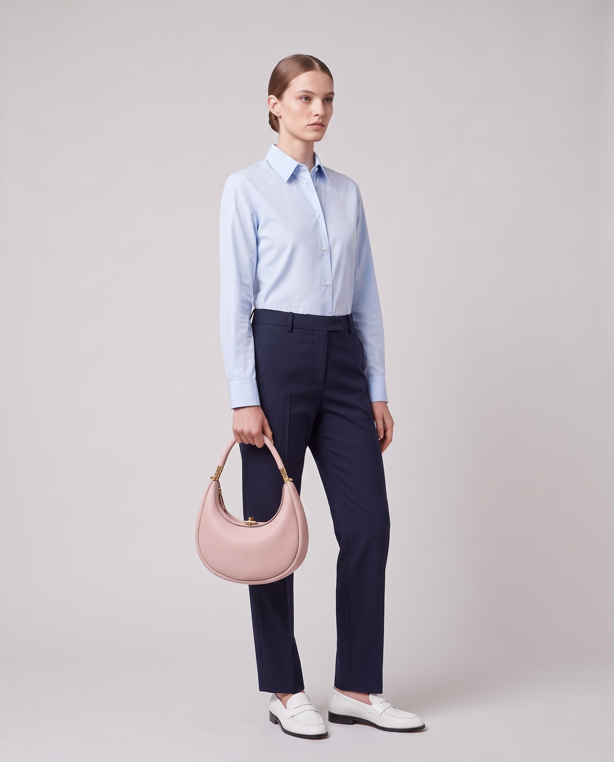 Model carrying the Todi crescent bag in Lavender