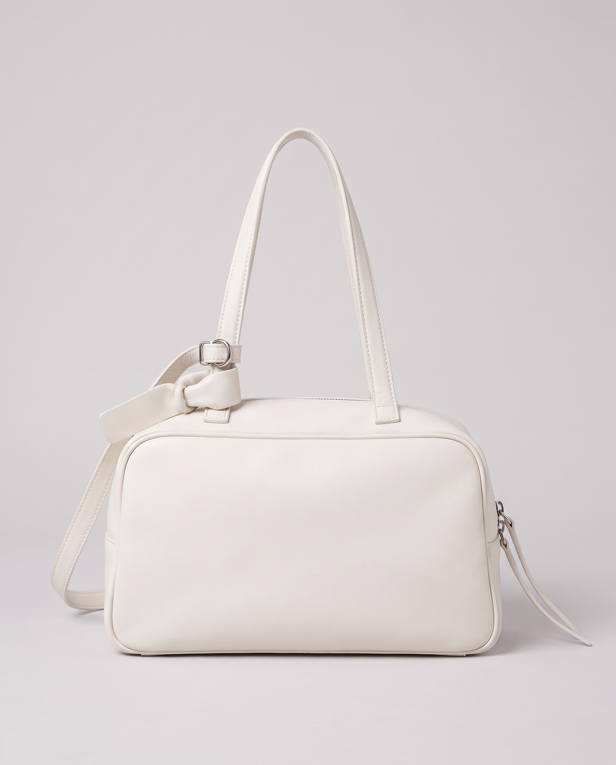 Hardware and handle detail on the Valentina Treviso Small bag in White