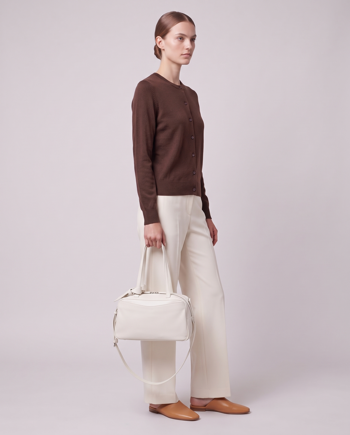 Model carrying the Valentina Treviso Small bag in White